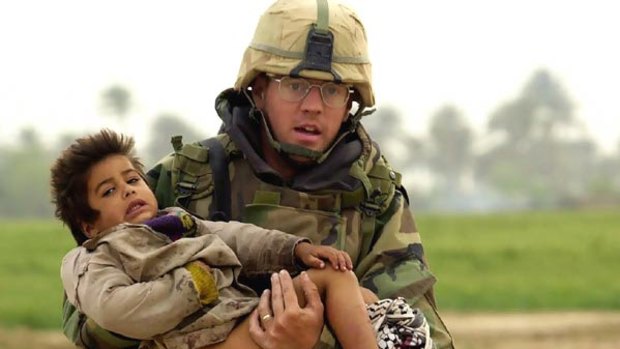 This 2003 image of Joseph Dwyer carrying a young Iraqi boy to safety had represented a heroic view of the US invasion.