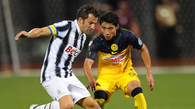 Italian stallions: Juventus captain Alessandro Del Piero holds off Jorge Reyes of Club America in New York this week.