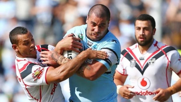 Sharks prop Andrew Fifita tries to muscle his way through the Warriors defence last Saturday in Cronulla's big win.