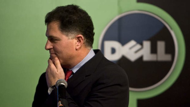 FILE - In this Thursday, March 26, 2009, file photo, Michael Dell, Chairman and CEO of Dell Inc., reacts to a question during a press conference in Beijing, China.  Slumping personal computer maker Dell announced Tuesday, Feb. 5, 2013, it is bowing out of the stock market in a $24.4 billion buyout that represents the largest deal of its kind since the Great Recession dried up the financing for such risky maneuvers. billion. Michael Dell, who owns nearly 16 percent stake in the company, will remain the CEO after the sale closes and will contribute his existing stake in Dell to the new company. (AP Photo/Alexander F. Yuan, File)