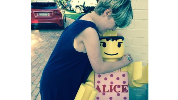Charlie Bigg-Wither's daughter Alison and her lego statue he believes was stolen on Thursday night.