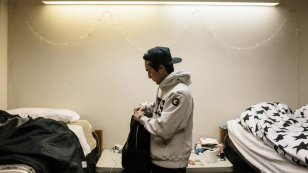 Roy Kim in his dormitory room on the Georgetown University campus.