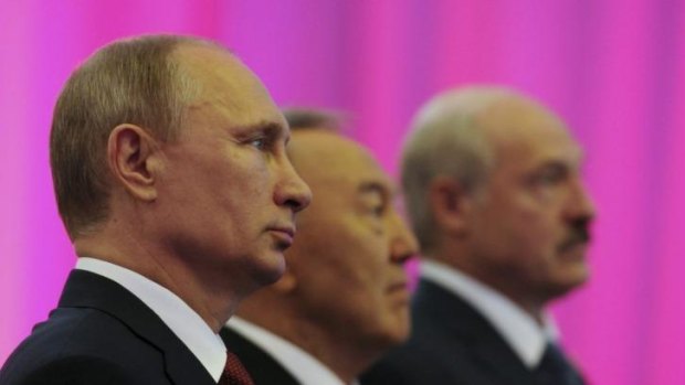 Russian President Vladimir Putin (left), Kazakh President Nursultan Nazarbayev (centre) and Belarus President Alexander Lukashenko are photographed before a meeting of the Eurasian Economic Union.