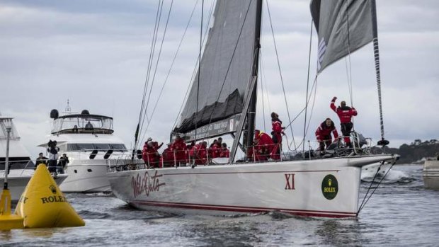 Wild Oats XI crew celebrate after their record-breaking win.