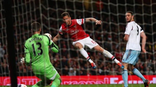 Olivier Giroud scores Arsenal's second goal.