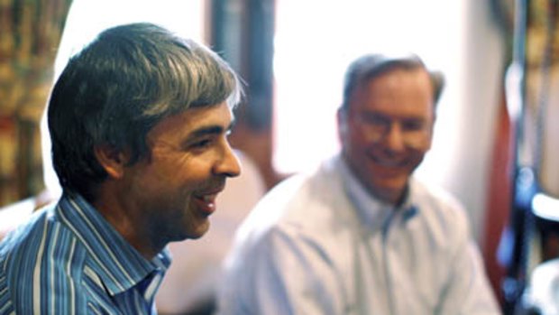 Google co-founder and now CEO, Larry Page, talks to reporters as former Google CEO Eric Schmidt (right) watches at the Sun Valley Inn in Sun Valley, Idaho in this July 9, 2009 file photo.