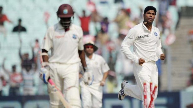 Goodbye ... Umesh Yadav celebrates the scalp of Shivnarine Chanderpaul.