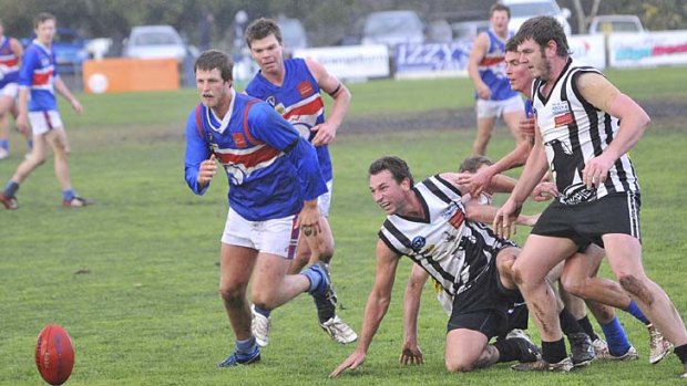 Finale: Hamilton Imperials and Hamilton players on the run in what is expected to be the last local derby between the clubs, on July 1.