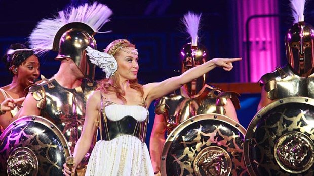 Into battle: Kylie Minogue marches out her on-stage troops for the launch of Aphrodite Les Folies Australian tour in Brisbane.