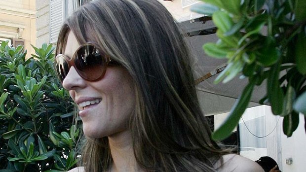 Hungry for love ... Liz Hurley leaves Bolognese Restaurant in central Rome last month.