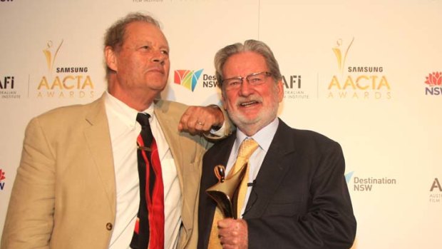 Prolific director Bruce Beresford and cinematographer Don McAlpine with trophy in hand at the 2012 AACTA Awards in Sydney.