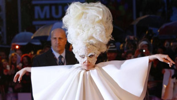 Up in the air ... Lady Gaga arrives at the Brit awards.
