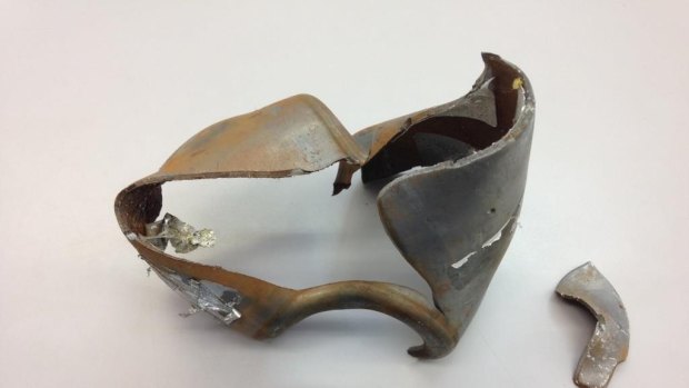 Metal pieces from a Takata air bag module that ruptured in Japan. 