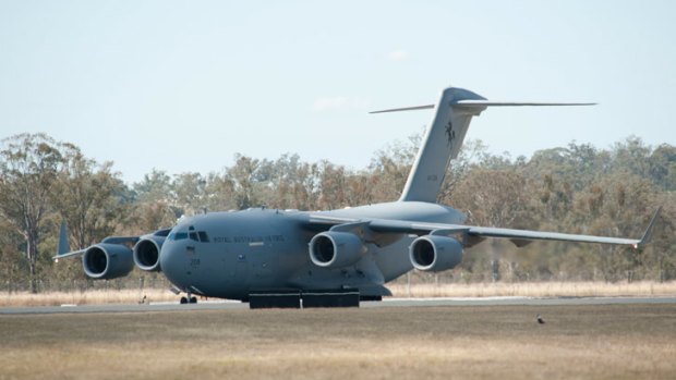 The plane carrying the bodies of Lance Corporal Stjepan ‘Rick’ Milosevic, Sapper James Martin and Private Robert Poate comes lands at RAAF base in Amberley.