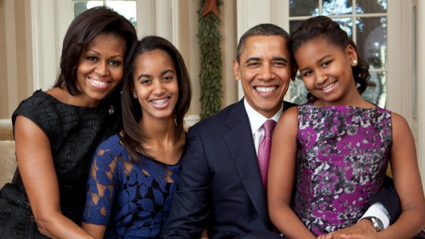 The official Obama family portrait: Michelle with Barack and children Malia and Sasha.