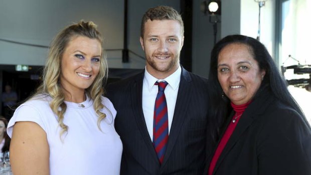 Talented family: Ruan Sims with brother Korbin and mum Jacky at this week's Women in League function.