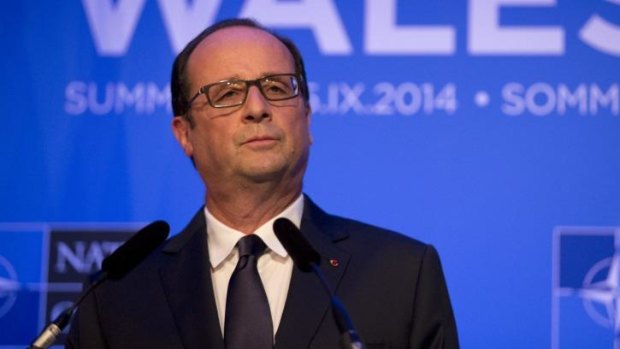 Vowing to fight on ... French President Francois Hollande's leadership is under pressure as his approval rating slipped to a record low of 13 per cent.