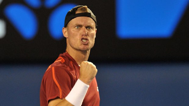 Lleyton Hewitt gives a familiar fist pump en route to beating Cedrik-Marcel Stebe in round one on Tuesday.