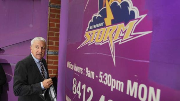 News Ltd heavyweight John Hartigan arrives at Melbourne Storm headquarters yesterday to sort out the mess, as claims emerged that executives knew of irregularities.