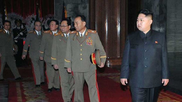 Kim Jong-un walks with  top military officers, including Jang Song-thaek, left,  as they pay their respects to former leader Kim Jong-il lying in state at the Kumsusan Memorial Palace in Pyongyang.