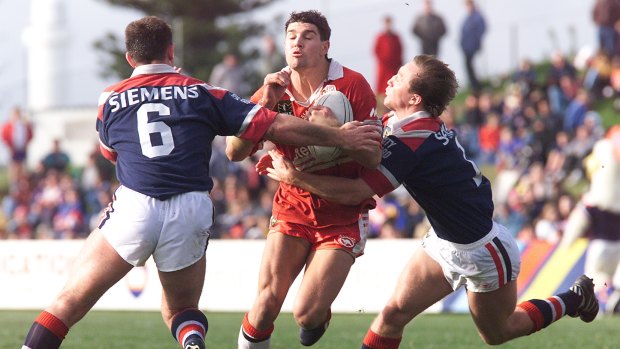 Young buck: Trent Barrett takes the ball up for the Illawarra Steelers against the Roosters in 1998.
