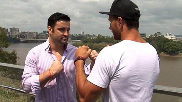 Barry Dunnett shapes up to boxing opponent Quade Cooper at Kangaroo Point.