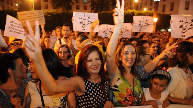 Moroccan women, wearing sleeveless garments in solidarity, protest to support two women who are being prosecuted for wearing  "inappropriate" clothing and who have been charged with the offence of gross indecency.
