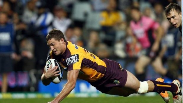 Broncos winger Corey Oates diver over to score against Wests.