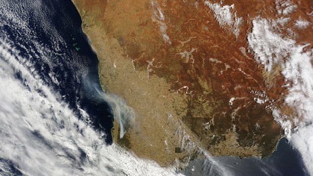 Smoke can be seen hovering over Perth skies.