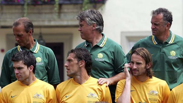 Long-time friends ... Tony Popovic in 2006 as a Socceroos defender (bottom middle) with assistant coach Graham Arnold (top right) at the World Cup finals in Germany.   popaarnie.jpg