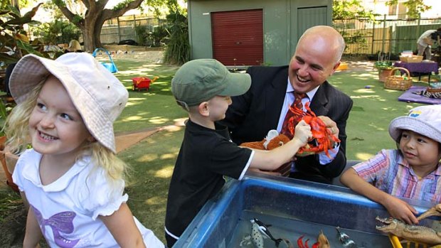 Play time: Minister Adrian Piccoli visits KU James Cahill Preschool in Waterloo to announce changes in preschool funding.