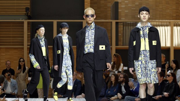 Tom Short (far left) made his modelling debut at Paris Fashion Week, although he doesn't plan to pursue a career in fashion.