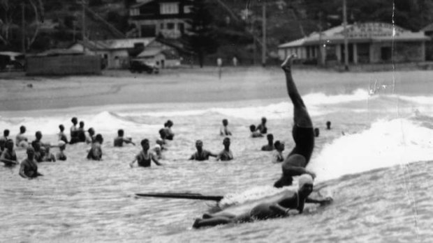 The rage ... Adrian Curlewis stunting on a timber board at Palm Beach.