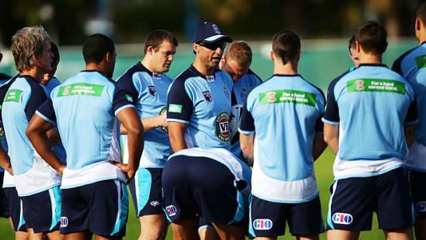 Under pressure: Blues coach Laurie Daley and the NSW team.