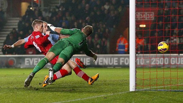 Saints alive: Southampton's Steven Davis scores in his team's 3-1 victory over Manchester City at St Mary's Stadium.