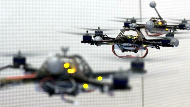 Quadrocopters are being used for everything from crowd control to surfing photography.