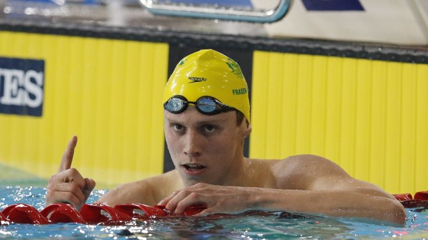 Number one: Thomas Fraser-Holmes celebrates after winning the 200m freestyle.
