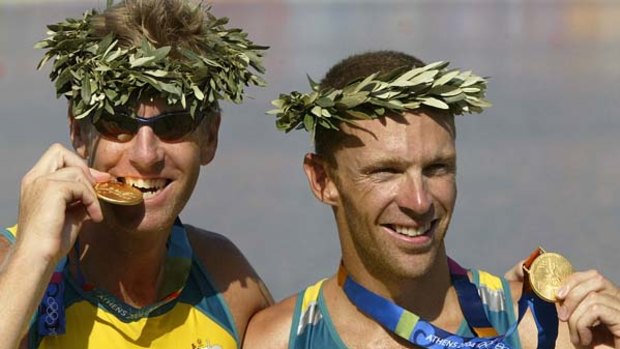 Drew Ginn, right, after winning the coxless pairs with  James Tomkins at the Athens Olympics in 2004.