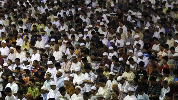 Changing face of Islam in Indonesia ... Muslims gather for Friday prayers at Istiqlal mosque in Jakarta, one of the largest in south-east Asia.