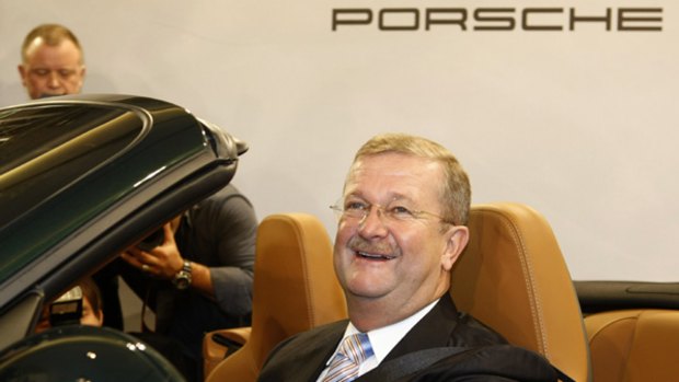 Insider trading probe ... in this November 26, 2008 file photo, Wendelin Wiedeking, then CEO of German car manufacturer Porsche Automobil Holding SE, poses in a Porsche 911 during the financial press conference  in Stuttgart, Germany.