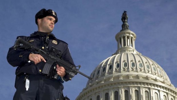 Bomb threat ... a police officer stands on guard in Washington.