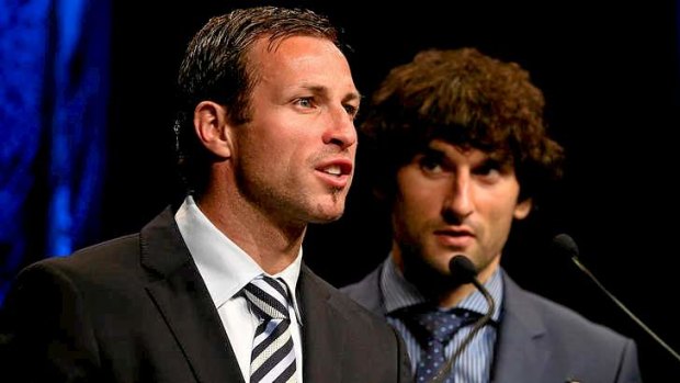 Honours: Lucas Neill and Mile Jedinak of the Socceroos announce the Team of the Year at the Australian Football Awards.