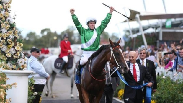 James McDonald celebrates after guiding Mossfun to victory in the Golden Slipper.