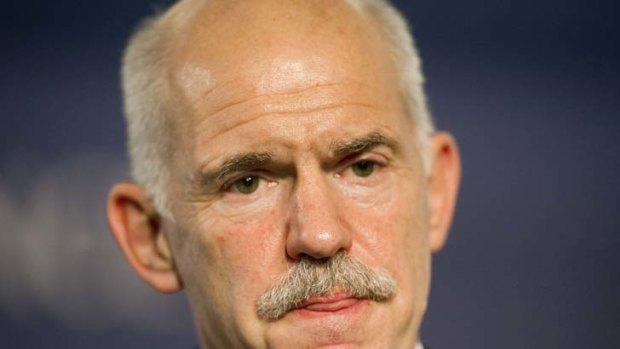 George Papandreou ... Deal done, but Greek PM will not stand for the leadership of the unity government.