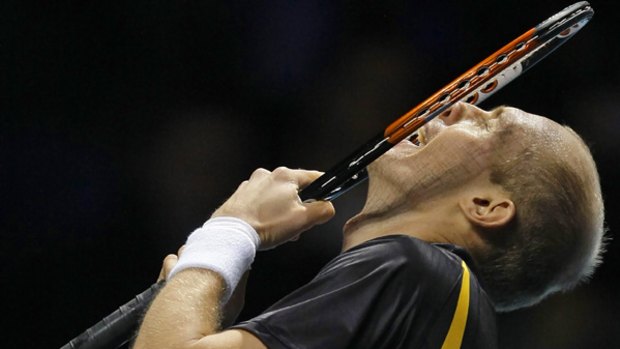 Nikolay Davydenko beat this year's three grand slam winners to claim the ATP World Tour Finals in London.