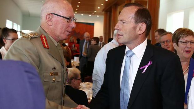 David Hurley greets the Prime Minister during an International Women's Day breakfast at Parliament House in  March.