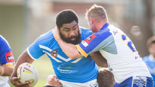 Blues prop Elijah Ngata makes a strong run in his side's 32-22 win against the Bulldogs.
