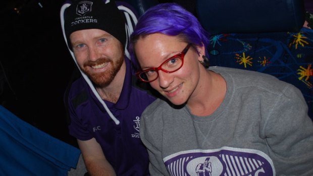 Purple haze: Eagles-turned-Fremantle fans Andrew Dean and Frances Finch.