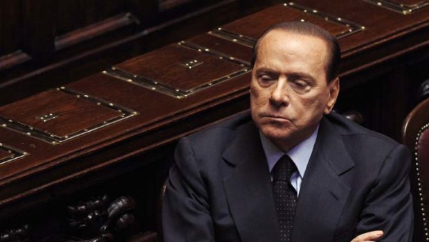 Teetering on the edge .... Silvio Berlusconi.