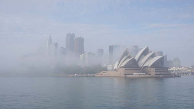 Fog blanketed Sydney Harbour this morning.